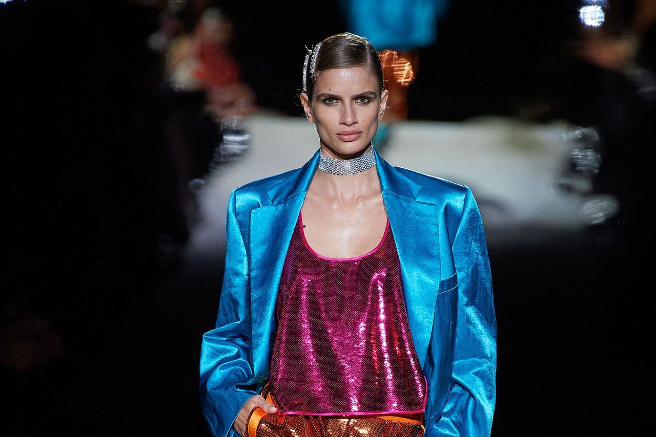 A model wears a choker on the runway at Tom Ford SS22