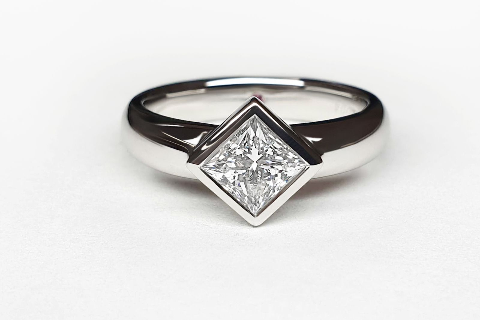 A princess-cut diamond ring with a rub-over platinum setting, courtesy of Taylor & Hart 