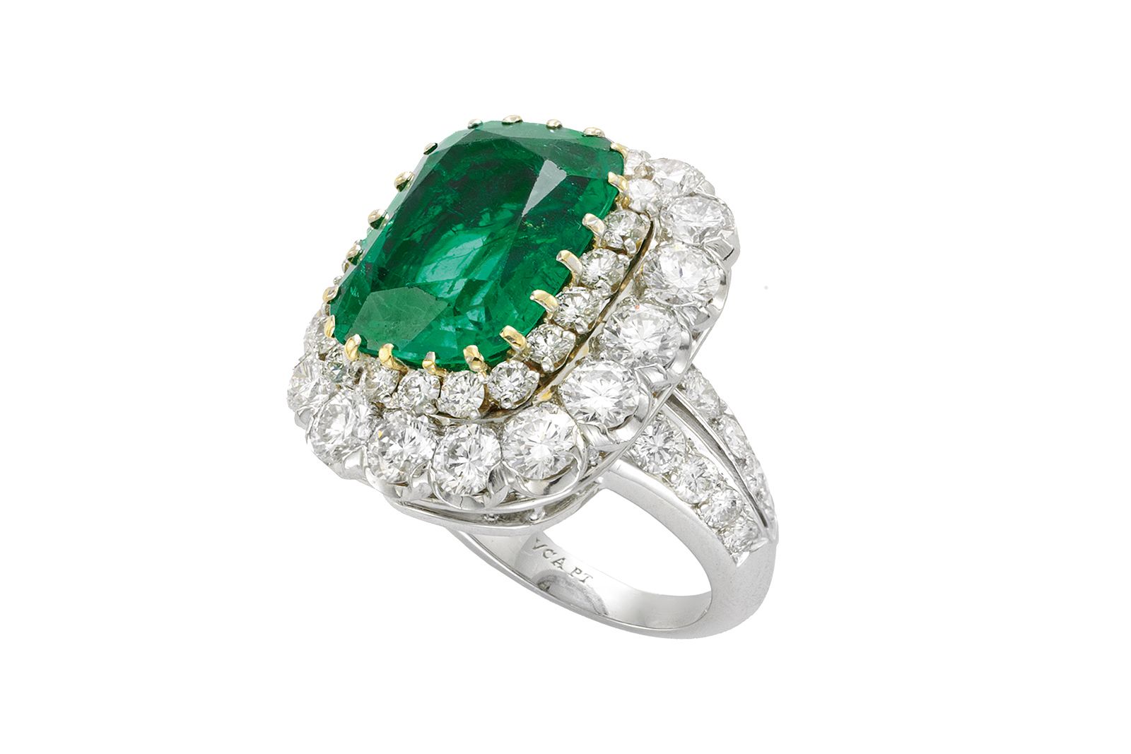 Van Cleef & Arpels ring with a 6.61 carat cushion-cut Colombian emerald in platinum, white gold and yellow gold, circa 1950 