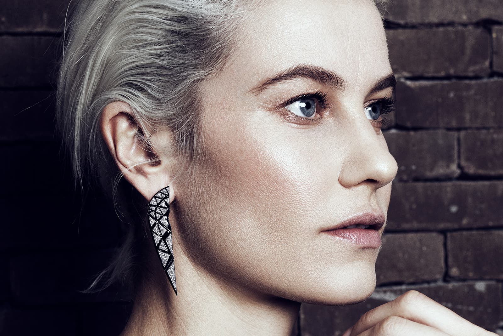 BARE by Dries Criel Sphinx earrings with diamonds and black enamel