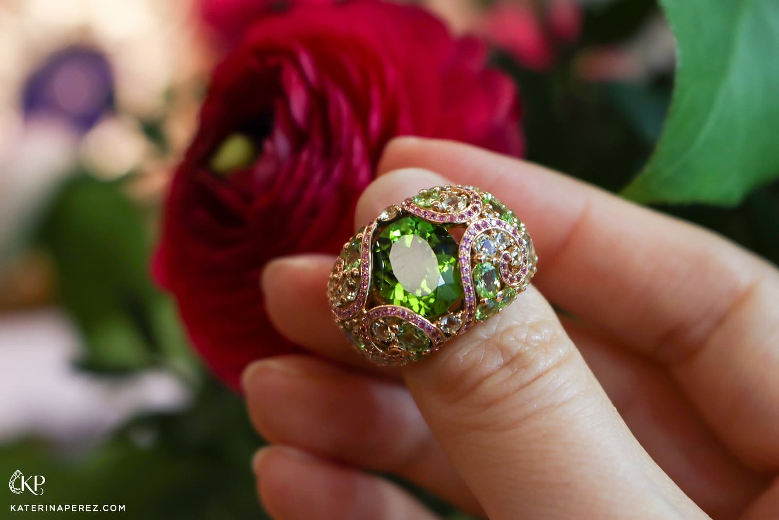 Isabelle Langlois cocktail ring set with an oval-shaped peridot