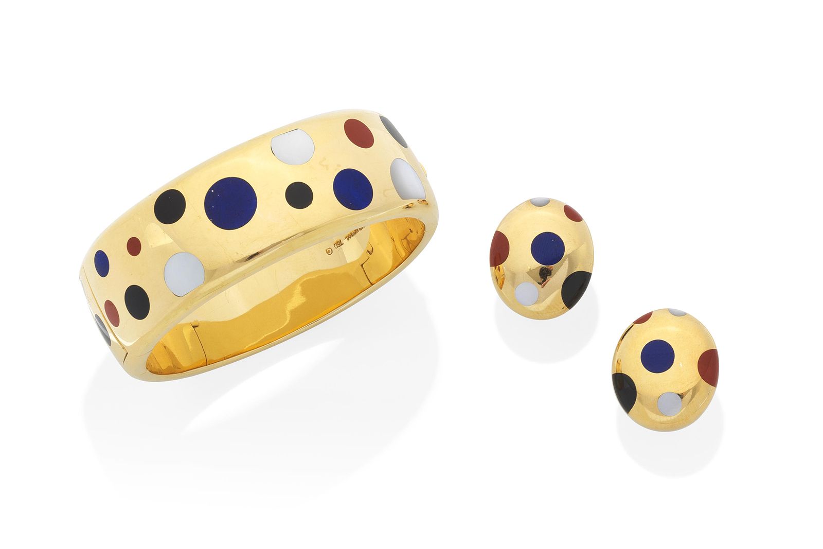  Angela Cummings for Tiffany & Co. gem-set bangle and ear clip suite, from the 1980s, with lapis lazuli, jasper, black jade and mother of pearl (Lot 10, estimate £5,000 - £7,000), featured in the Bonhams London Jewels auction