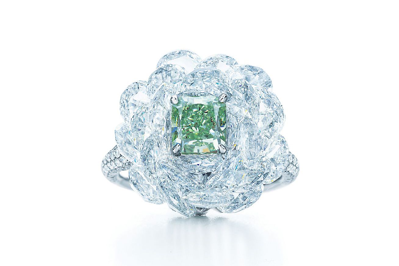 Radiant-cut Fancy Vivid Green diamond, carat weight 1.21; rose-cut white diamonds, carat total weight 9.20; round brilliant white diamonds, carat total weight 1.25 cts