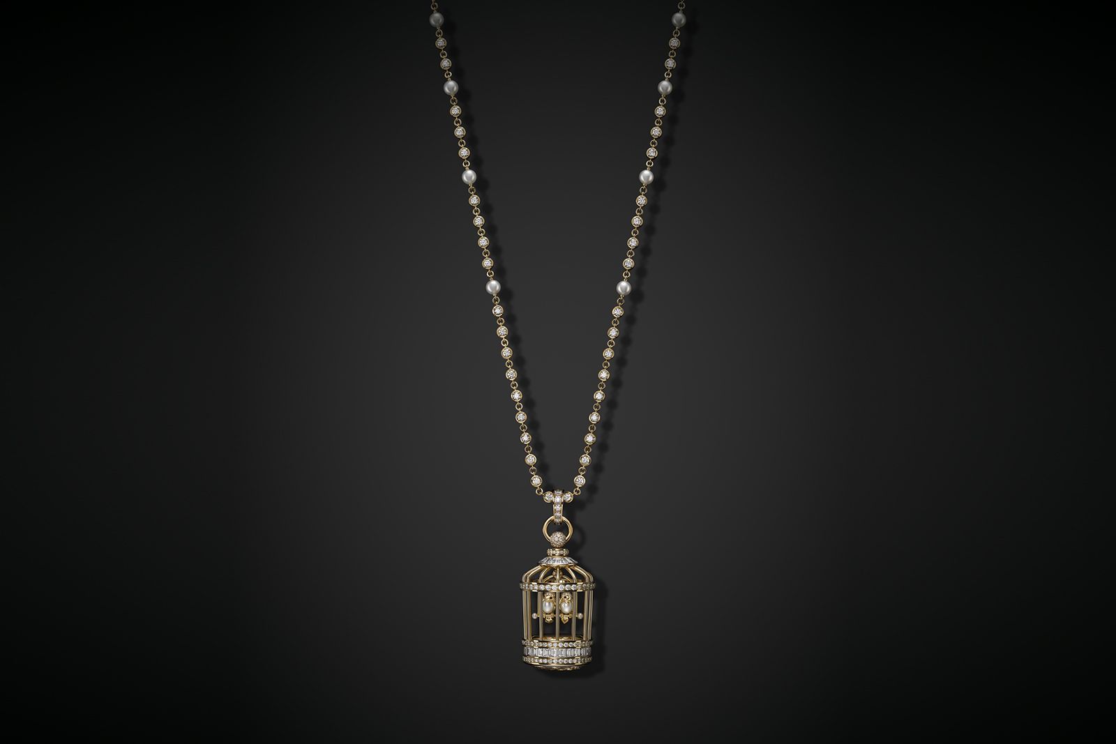 Mademoiselle Prive Cage long necklace featuring a hidden watch dial under the cage
