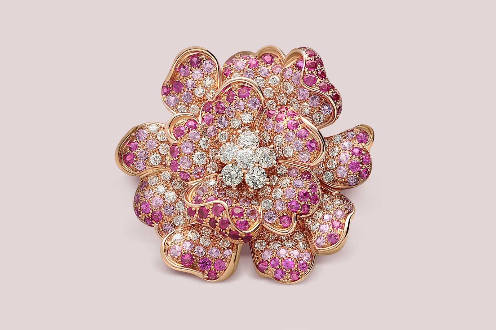 A flower creation with pink sapphires and diamonds by Leo Pizzo