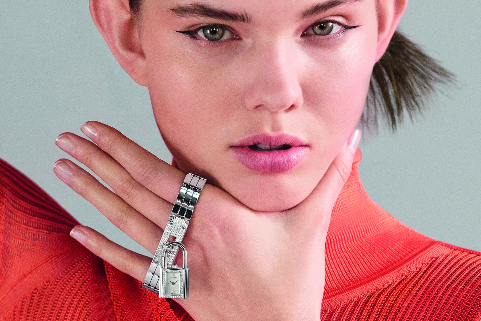 The New Kelly watch by Hermès in steel and set with diamonds 