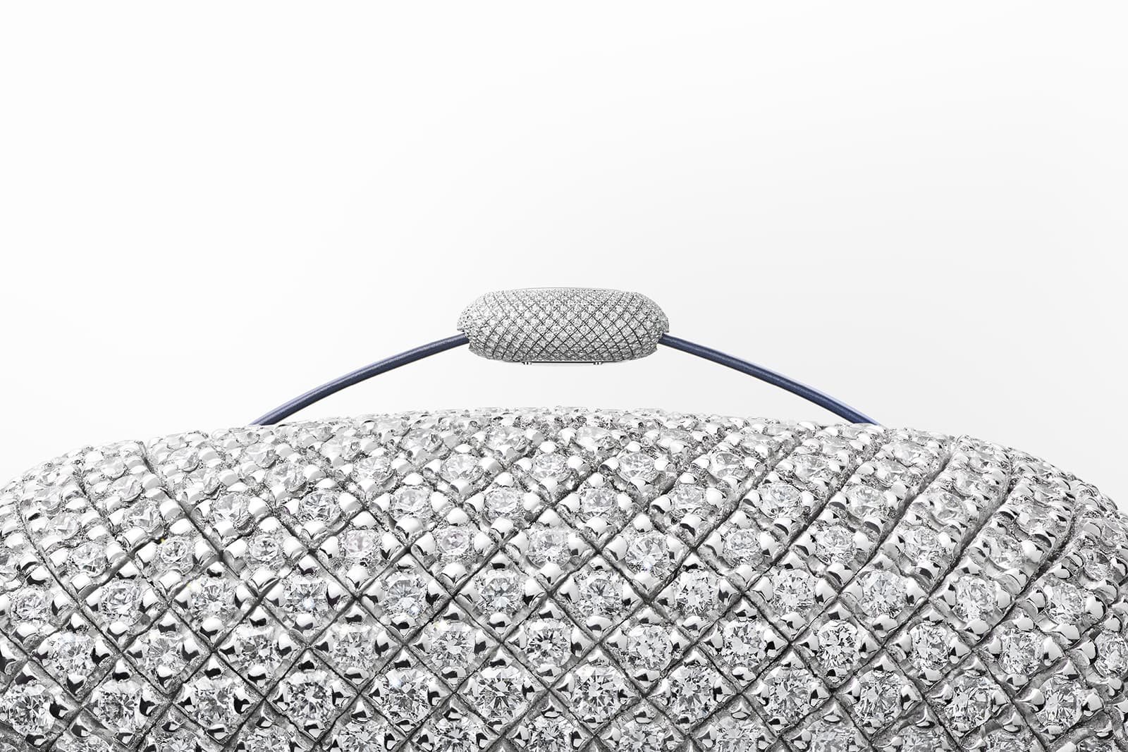  Coussin de Cartier watch with a woven white gold and diamond case that can deform and retract to its original shape