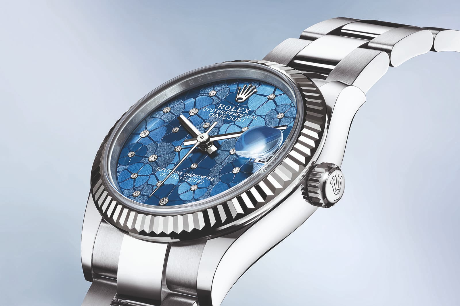  A closer look at the Rolex Oyster Perpetual Datejust 31 watch with an Azzurro blue floral dial, set with diamonds