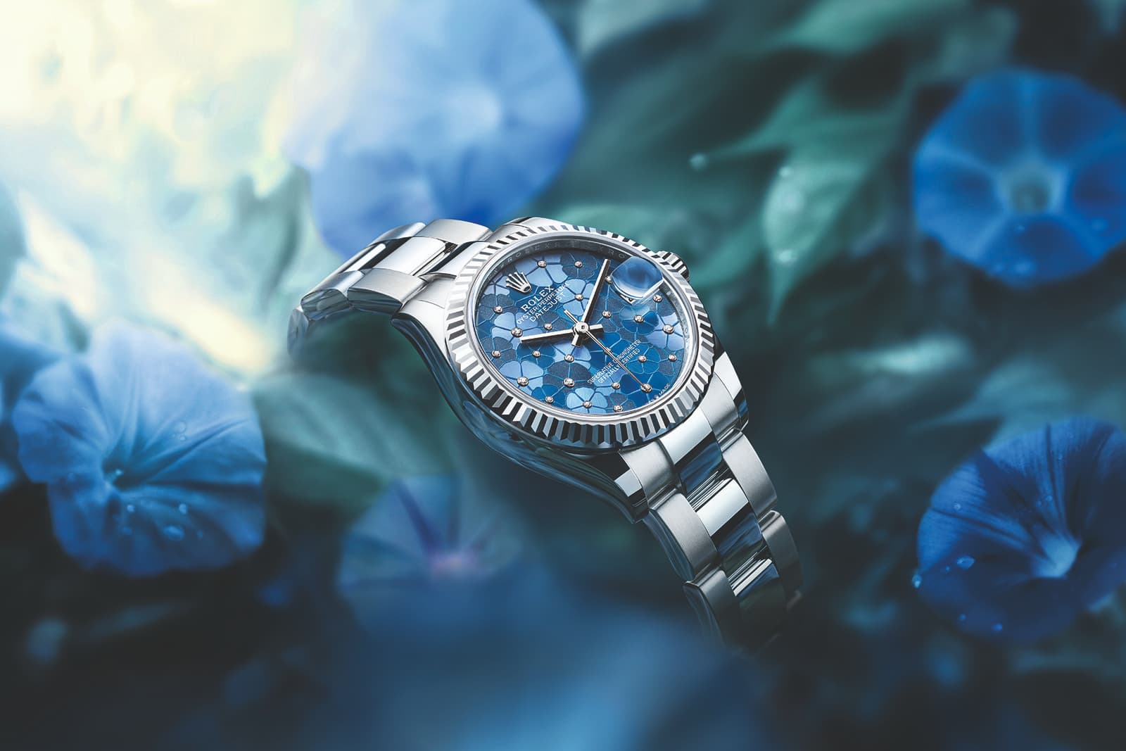  The Rolex Oyster Perpetual Datejust 31 watch with a floral motif dial in Azzurro blue