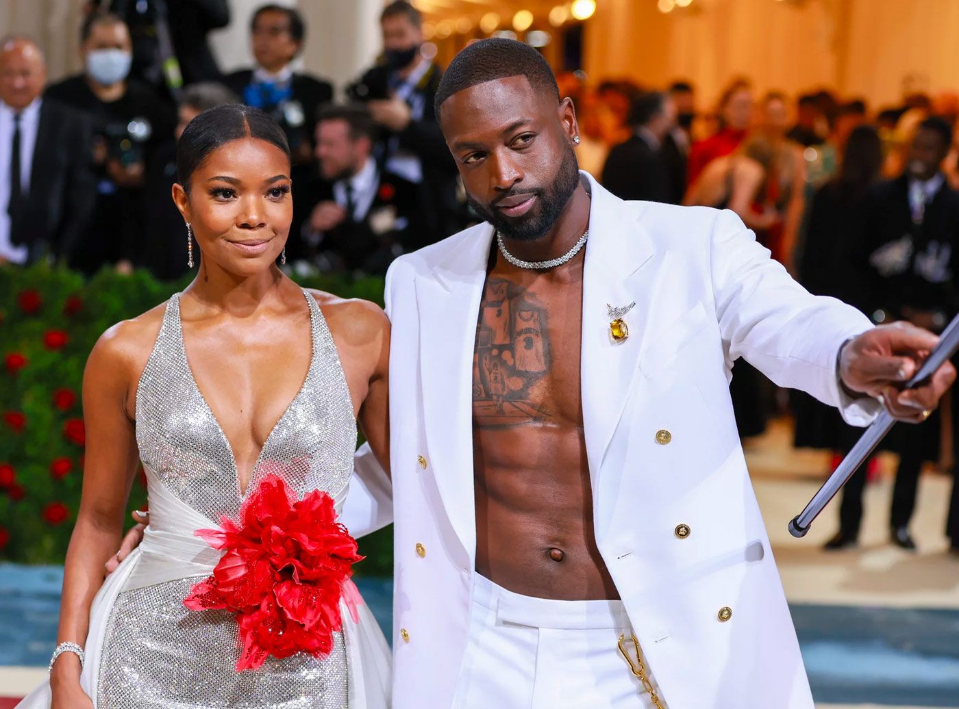 Gabrielle Union and Dwayne Wade at the Met Gala 2022 wearing white diamond jewellery by Tiffany & Co.  