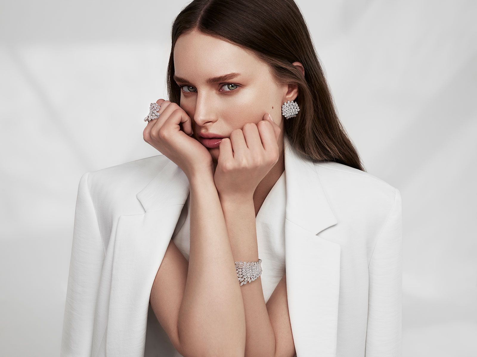A model wears a suite of Angelo diamond jewels by Italian brand Luvor