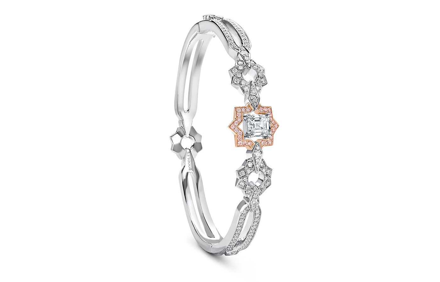  Boodles A Peace of Mined design bangle set with an emerald cut diamond in platinum and 18 carat SMO rose gold