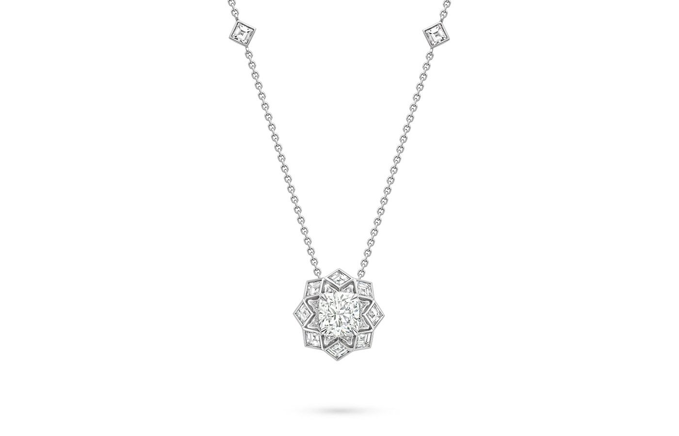  Boodles A Peace of Mined design pendant set with a cushion shape diamond and enamel in platinum