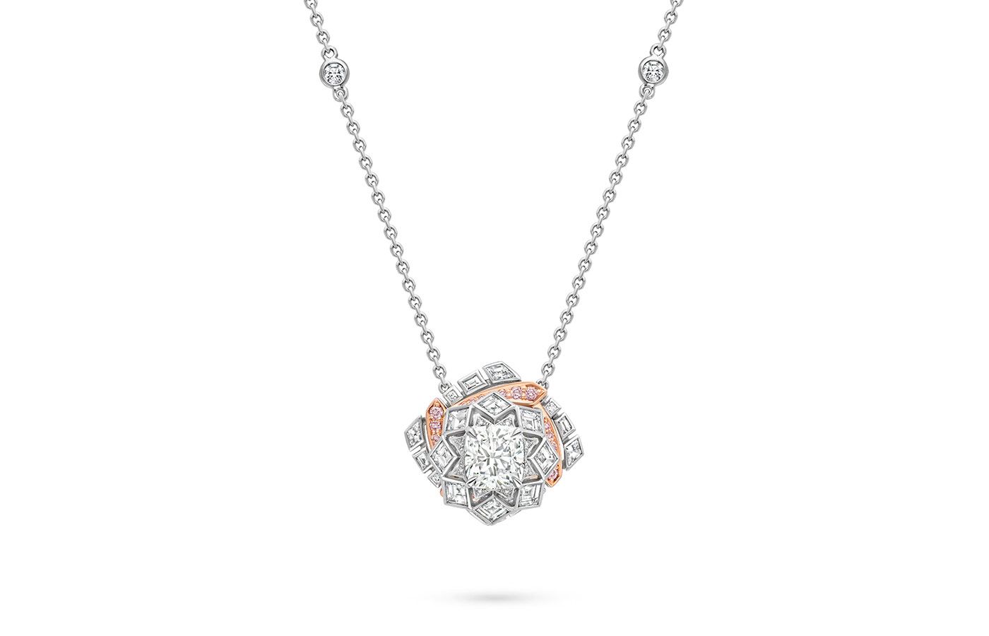  Boodles A Peace of Mined design pendant set with a cushion shape diamond in platinum and 18 carat SMO rose gold