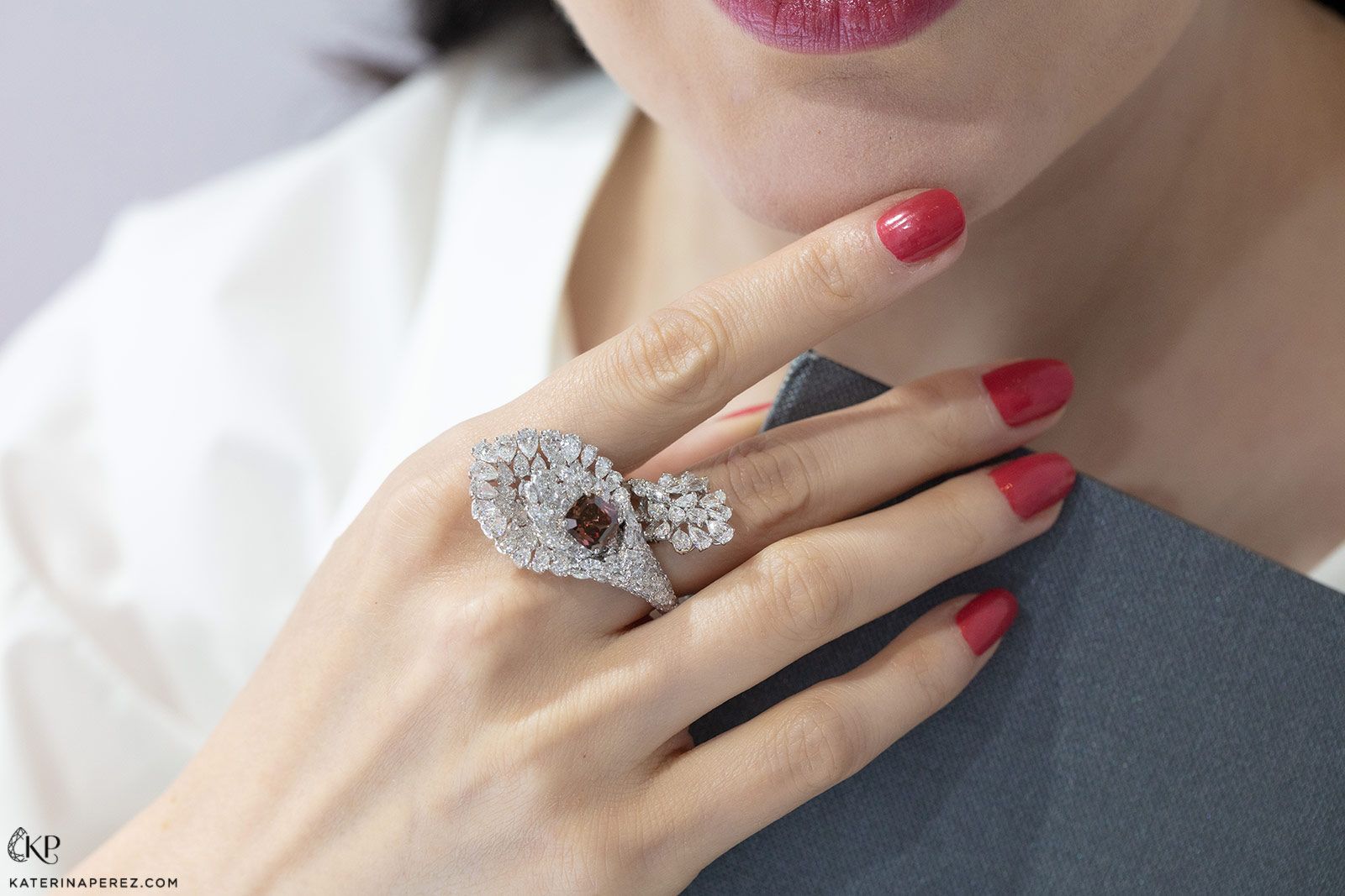 Novel Collection ring set with ‘The Majestic Diamond’ – a 2.07 carat fancy orangey-red diamond, surrounded by colourless diamonds