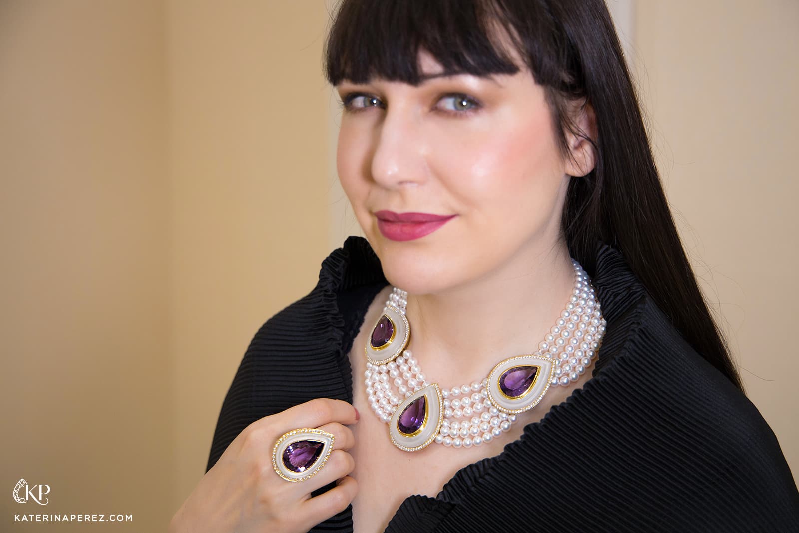 Katerina Perez wears the Veschetti Violetta jewellery set with Akoya pearls, amethysts and 5.60 carats of brilliant-cut diamonds