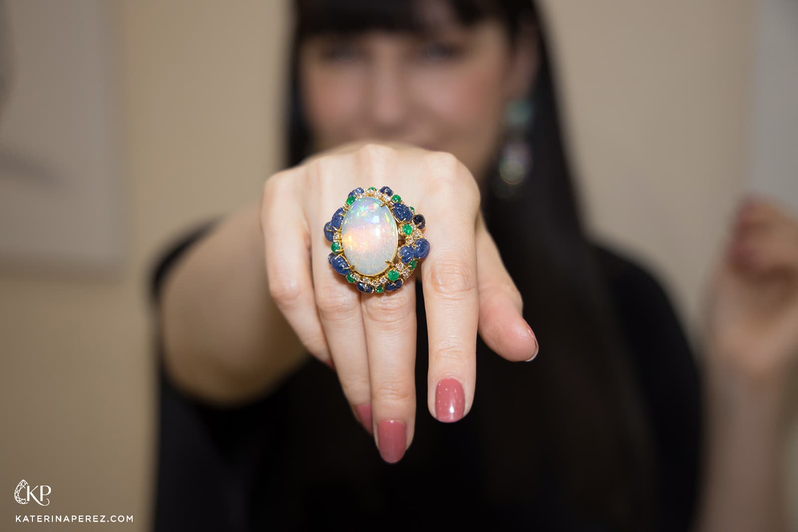  Veschetti Luna ring with an 18.05 carat cabochon opal, emeralds, diamonds and carved Burmese sapphires 