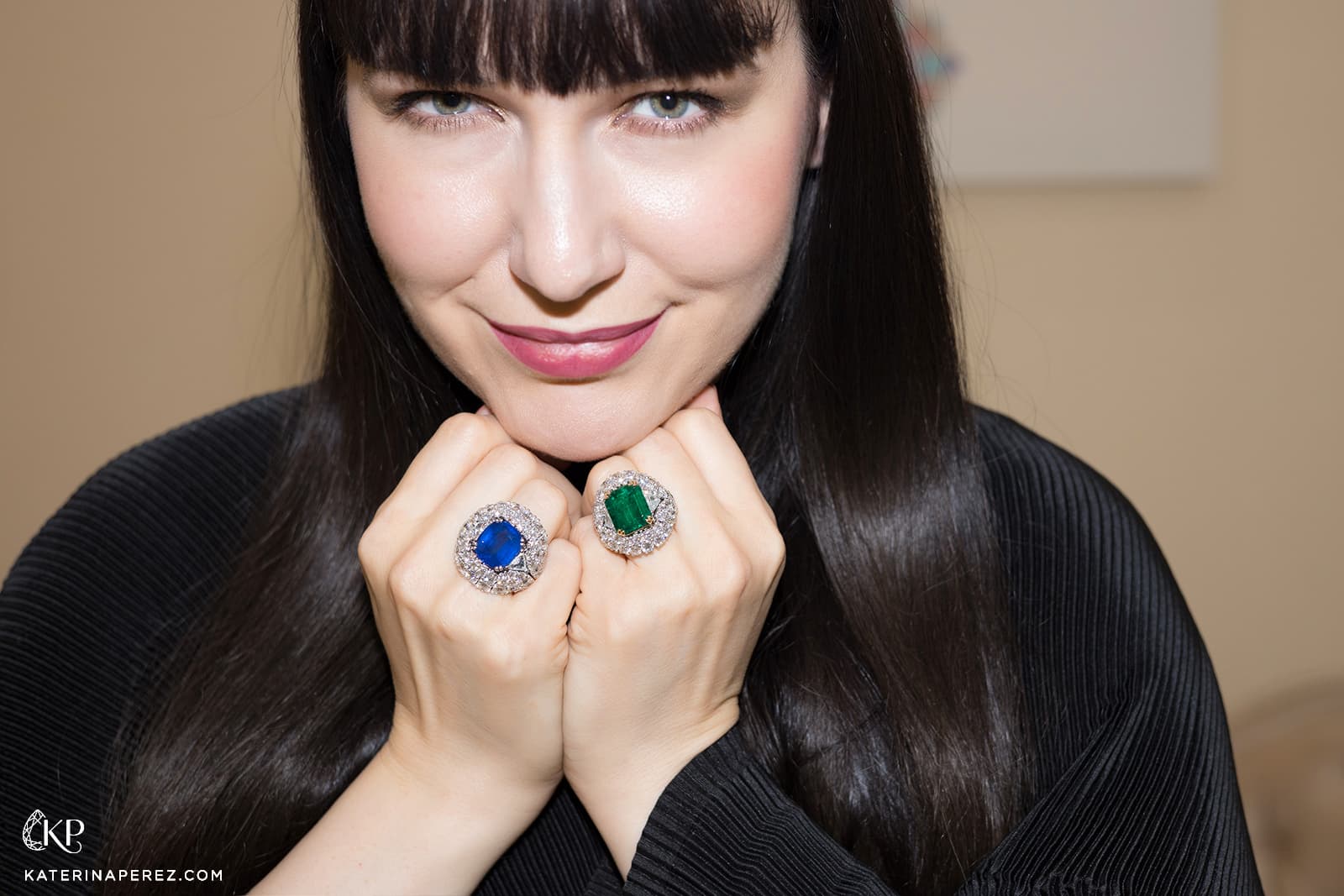 Katerina Perez wears Veschetti Guanto rings set with sapphires, emeralds and diamonds