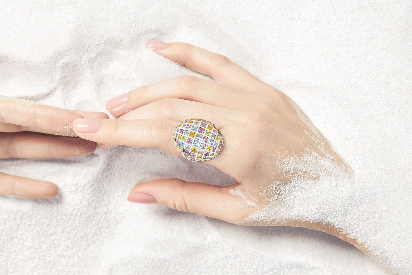 Aisha Baker Lip Gloss ring created from a series of princess-cut gemstones in a unicorn colour palette