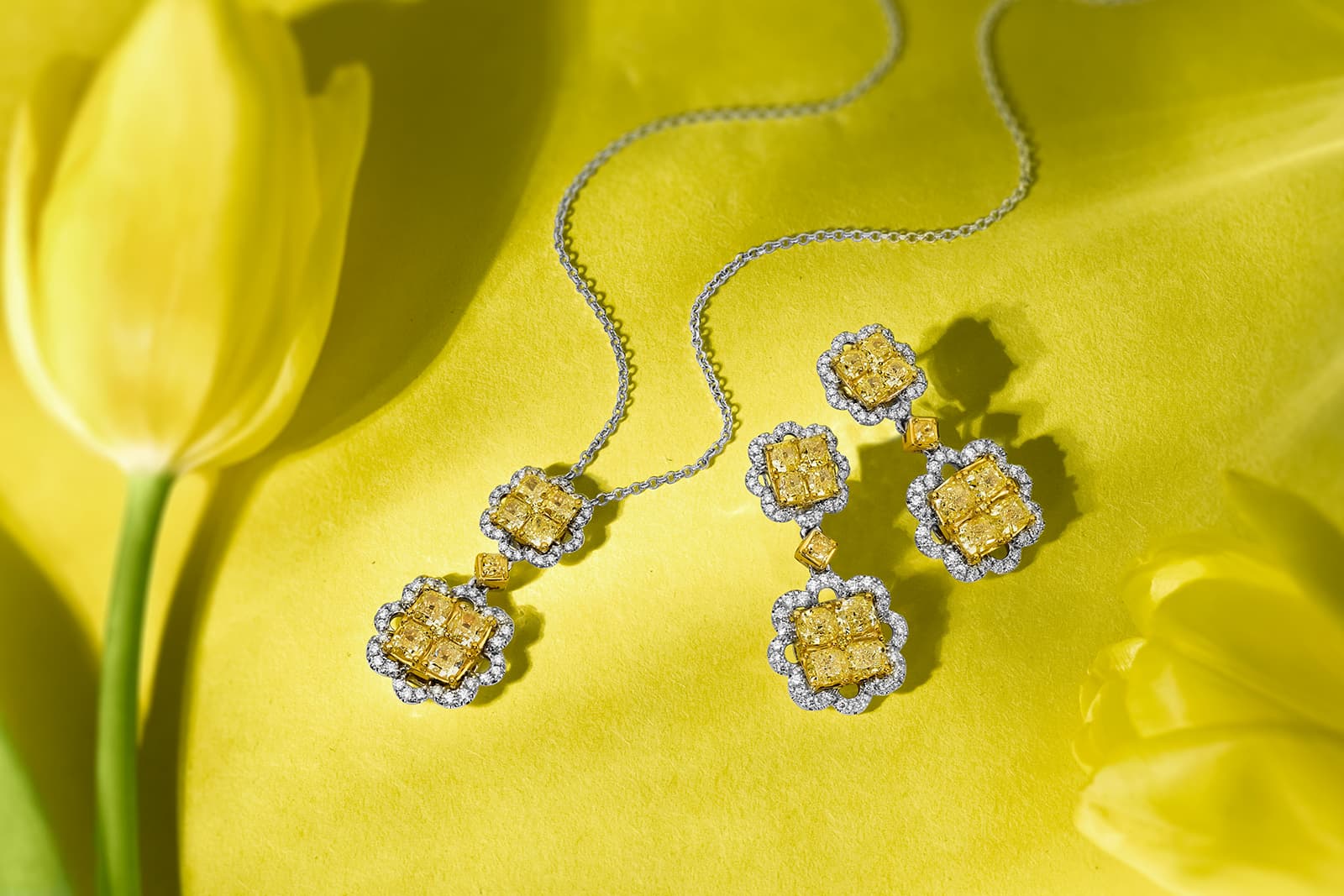 Illusion-set yellow diamond pendant and matching drop earrings by Le Vian