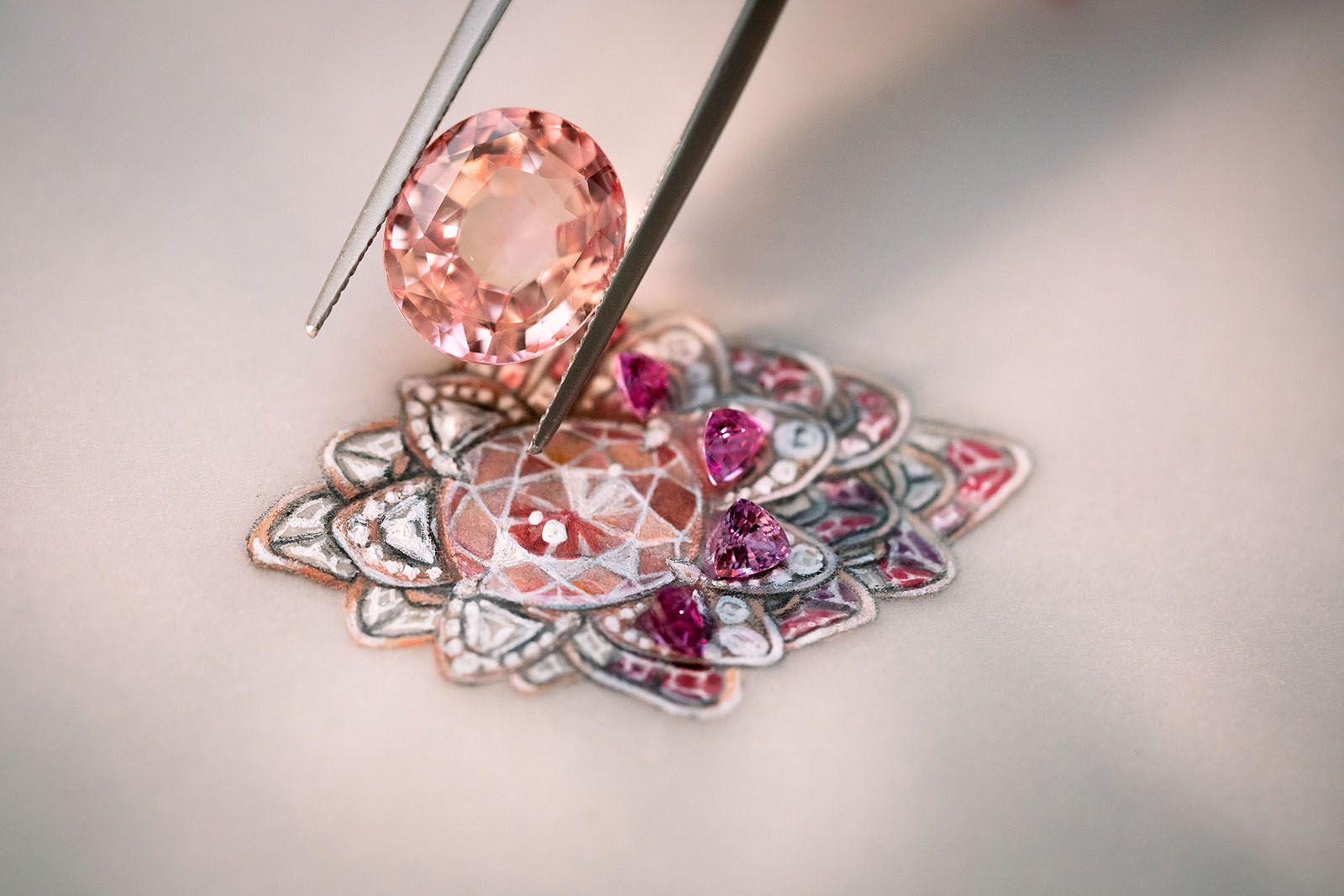  Building the colour story for the Gübelin Jewellery Flaming Grace cocktail ring, set with an oval-shaped Padparadscha sapphire