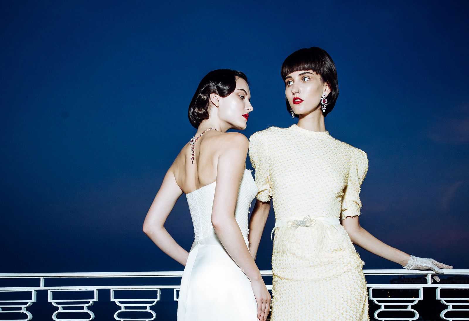  Models wearing Burmese 'Pigeon's Blood' ruby jewellery by Faidee