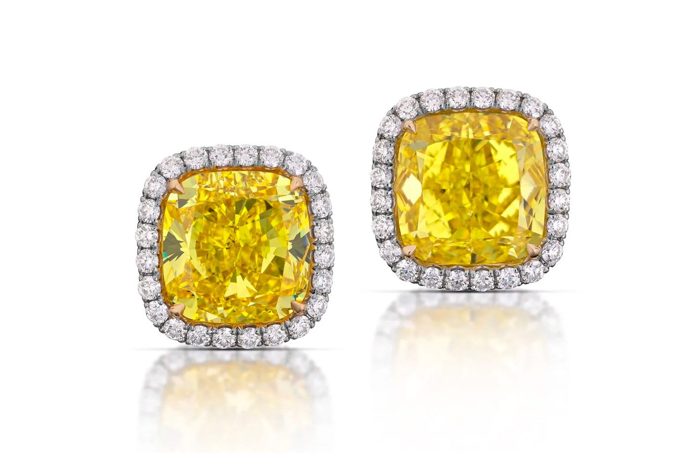 Stephen Silver earrings with canary yellow diamond centre stones and further colourless diamonds