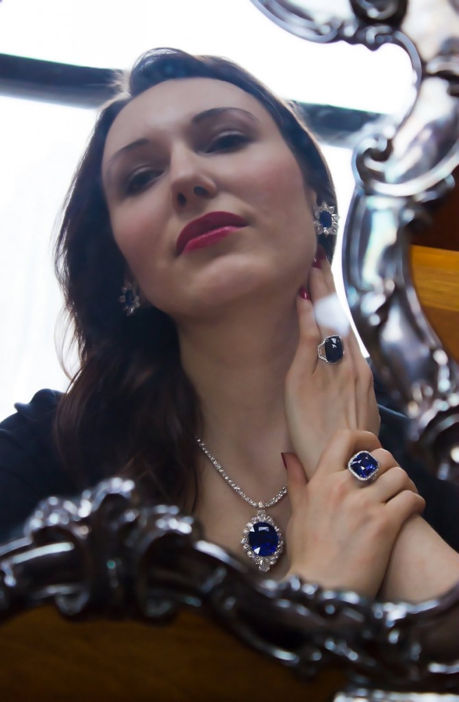 An impressive Burma sapphire set; Necklace with 60 carat oval Burma sapphire, earrings with a pair of 15 carat cushion-cut Burma sapphires, ring with a 22 carat cushion cut Burma sapphire. In addition there is a 28 carat sugarloaf cabochon Ceylon sapphire ring