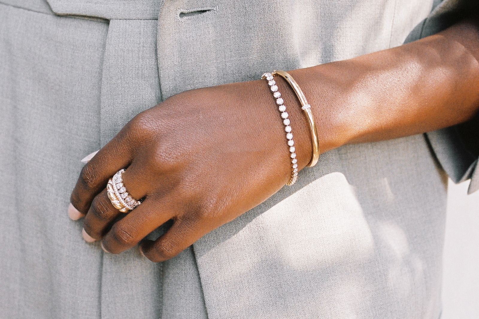  The George Rivière tennis bracelet from the Or & Elle x Meaghan Cox collection with other yellow gold and diamond pieces