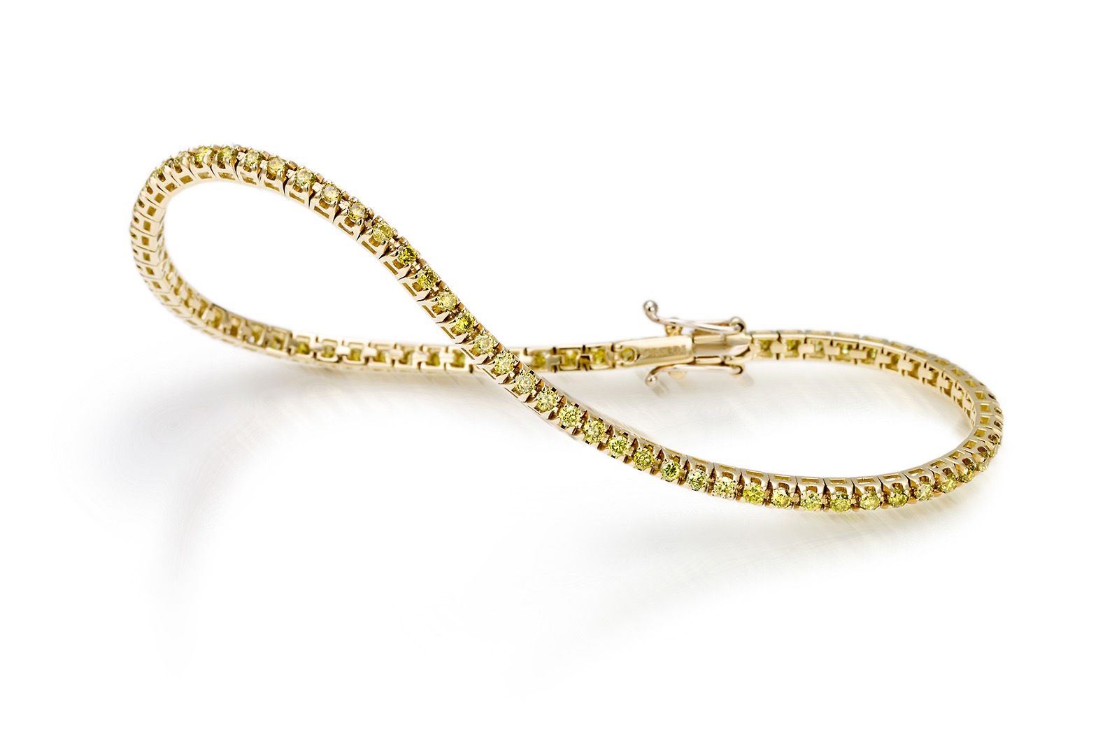 Crieri tennis bracelet with yellow diamonds set in yellow gold 