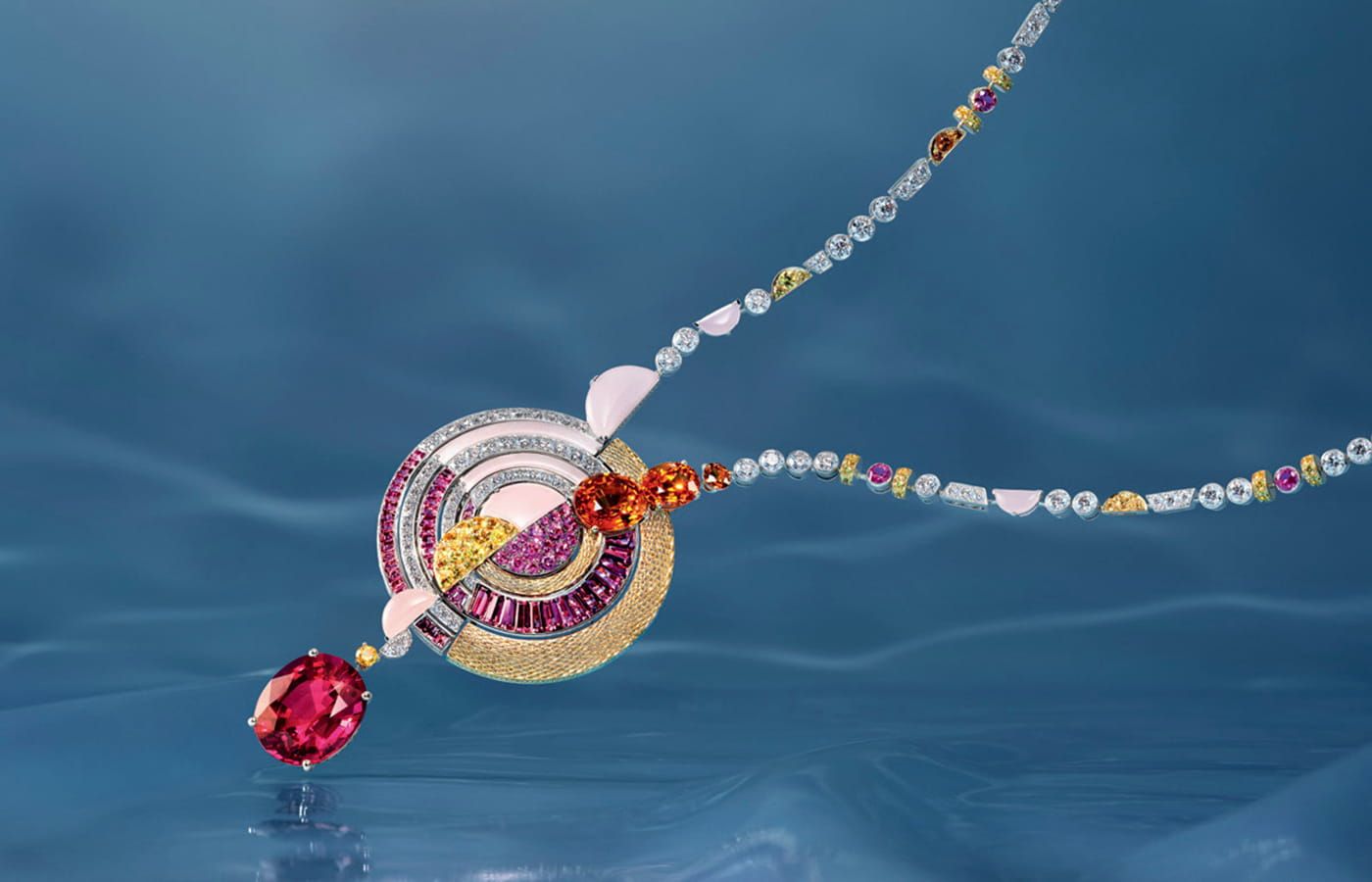 Chaumet Under The Sun necklace in yellow gold, white gold, rubellite, mandarine garnet, sapphire, ruby, chalcedony and diamond from the Ondes et Merveilles High Jewellery collection