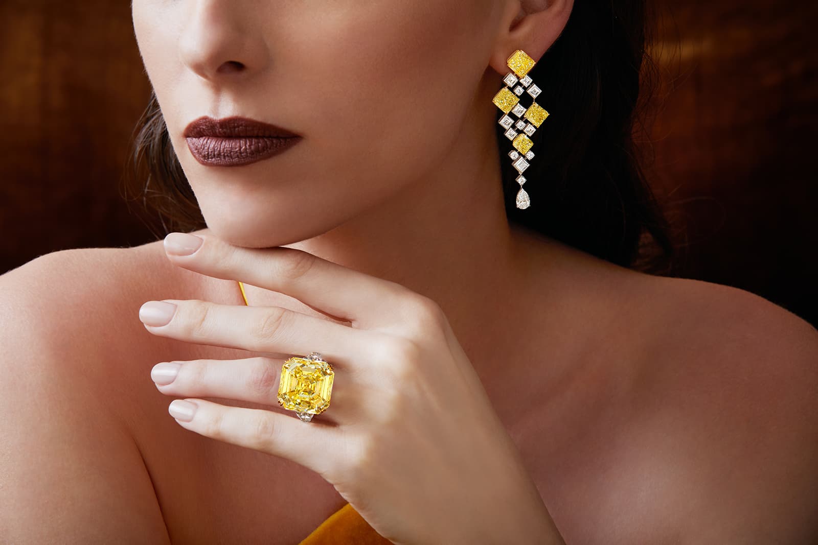  Ronald Abram 42.88 carat asscher-cut yellow diamond ring and Mosaic earrings
