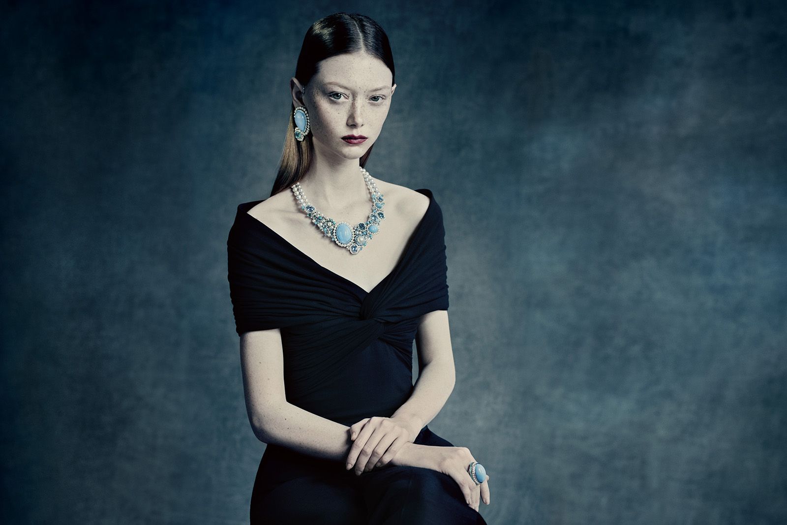 A model wears the Tasaki Atelier Radiant necklace from the Radiant Sky collection with Akoya pearls, South Sea pearls, diamonds, turquoise, aquamarine, blue zircon and Paraiba tourmaline in white gold