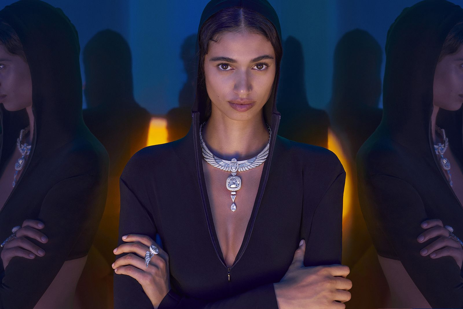 Model wearing Messika white gold and diamond Akh-Ba-Ka necklace and duo ring from the Beyond the Light High Jewellery Collection