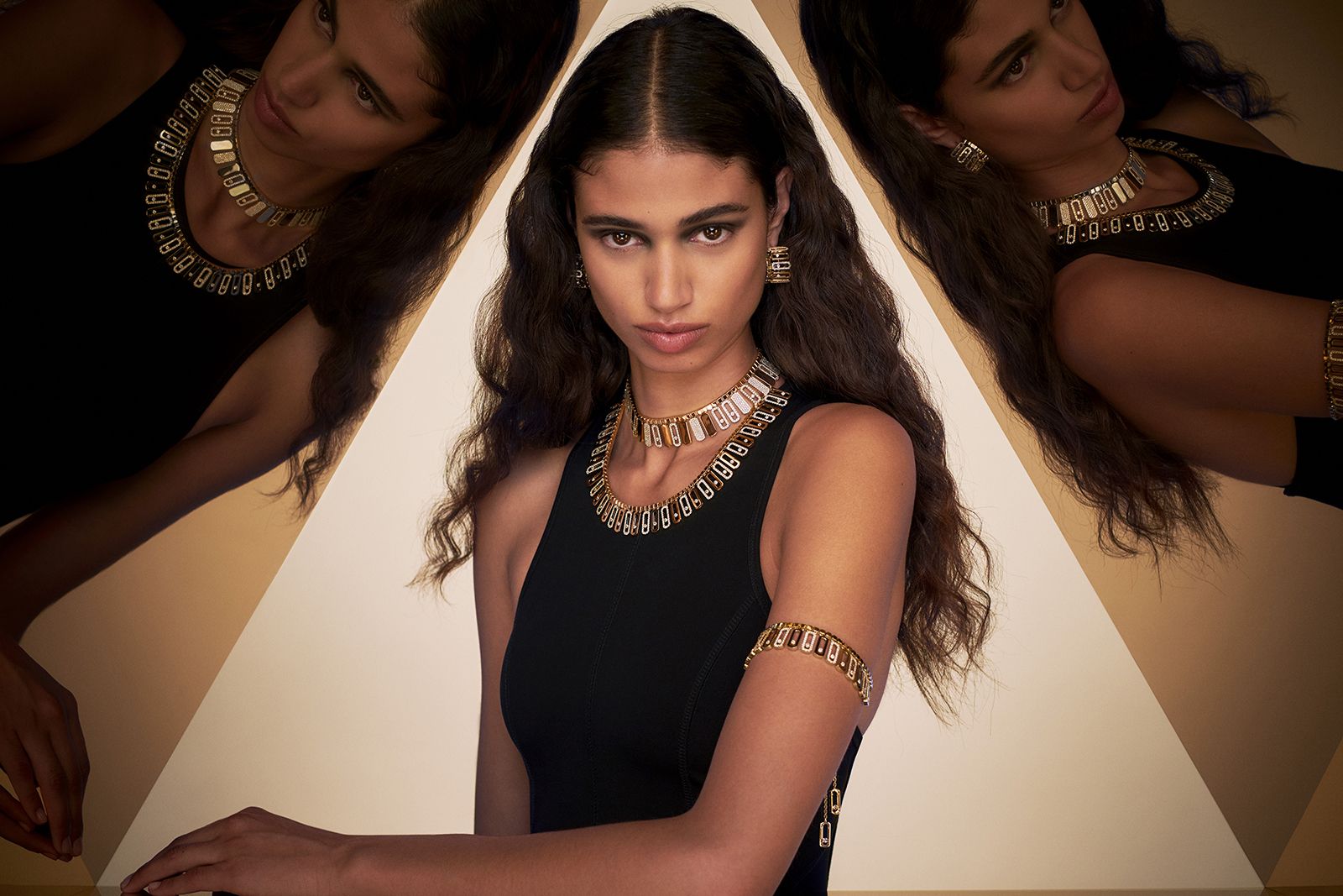 Model wearing Messika gold and diamond Move Iconica earrings, necklaces and bracelet from the Beyond the Light High Jewellery collection