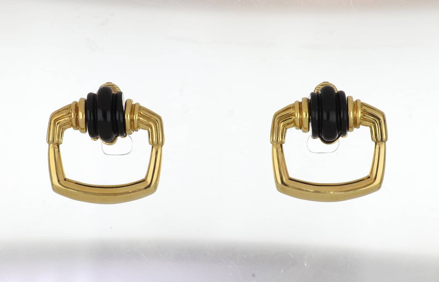  Metagolden Vintage Cartier 18K gold and onyx doorknocker earrings, designed by Aldo Cipullo