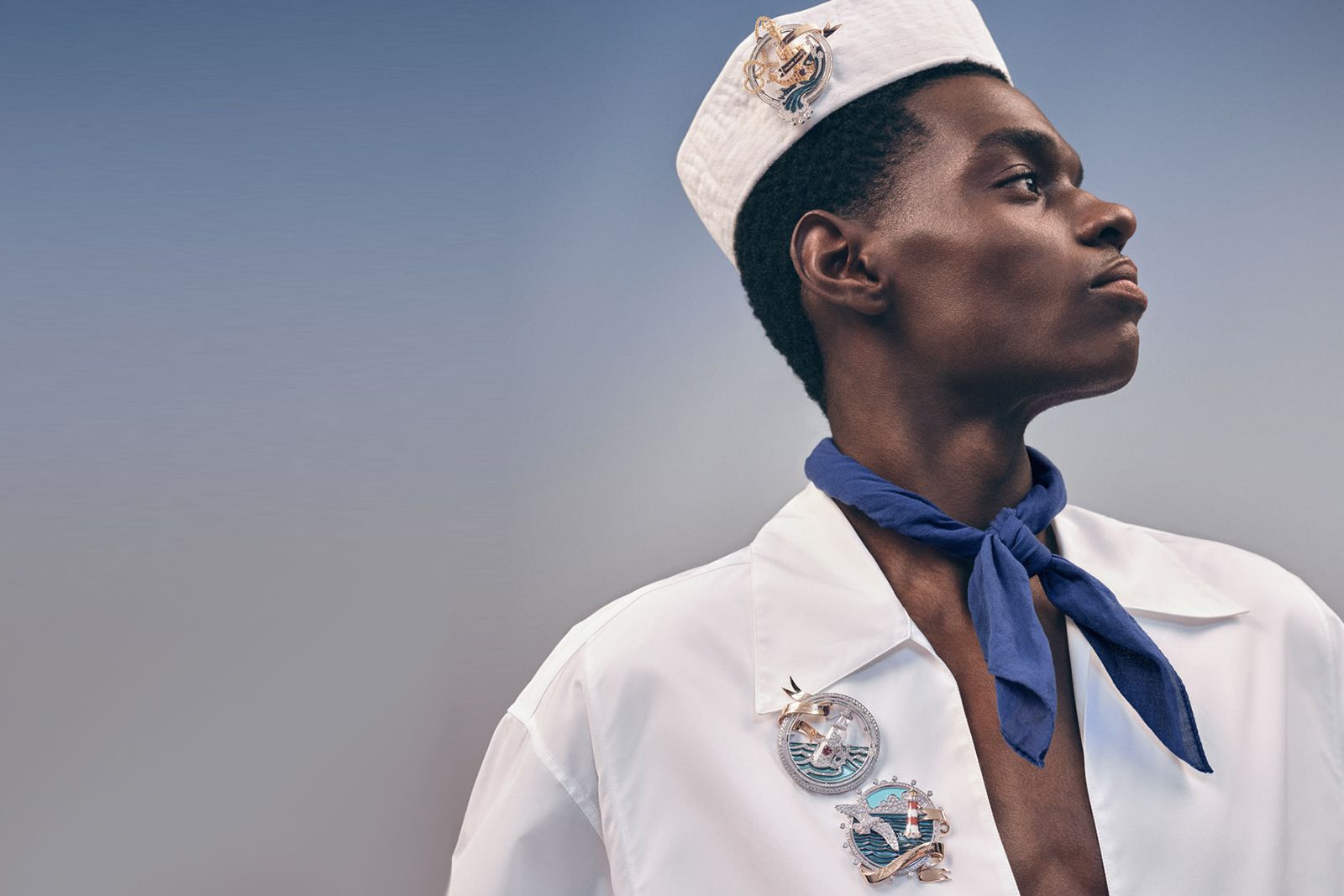 Model wearing Chaumet Encres Brooches from the Ondes et Merveilles High Jewellery collection 