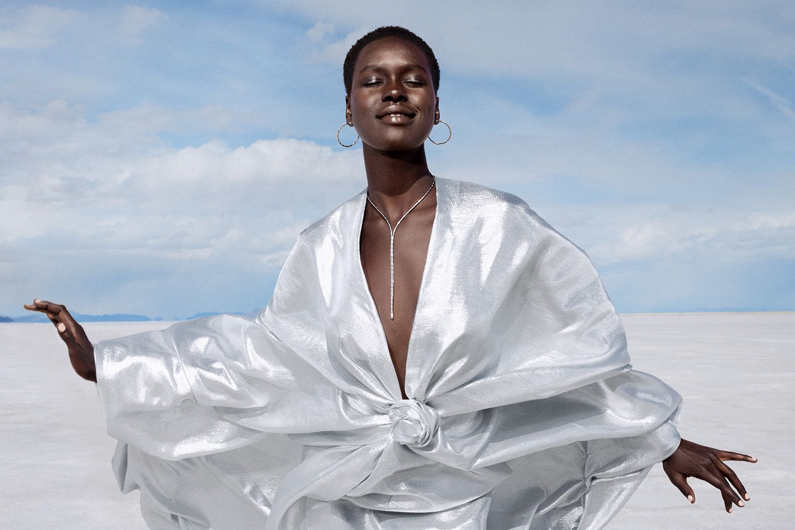  Model wearing Platinum Born platinum and diamond jewels