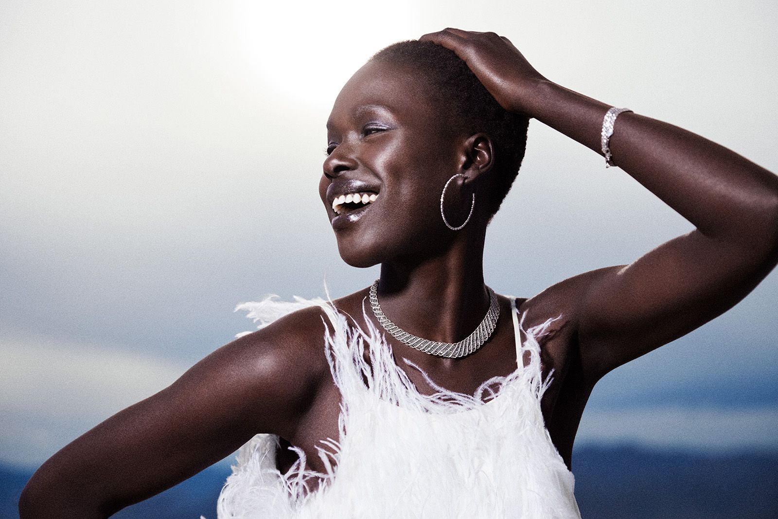 Model wearing Platinum Born platinum and diamond jewels
