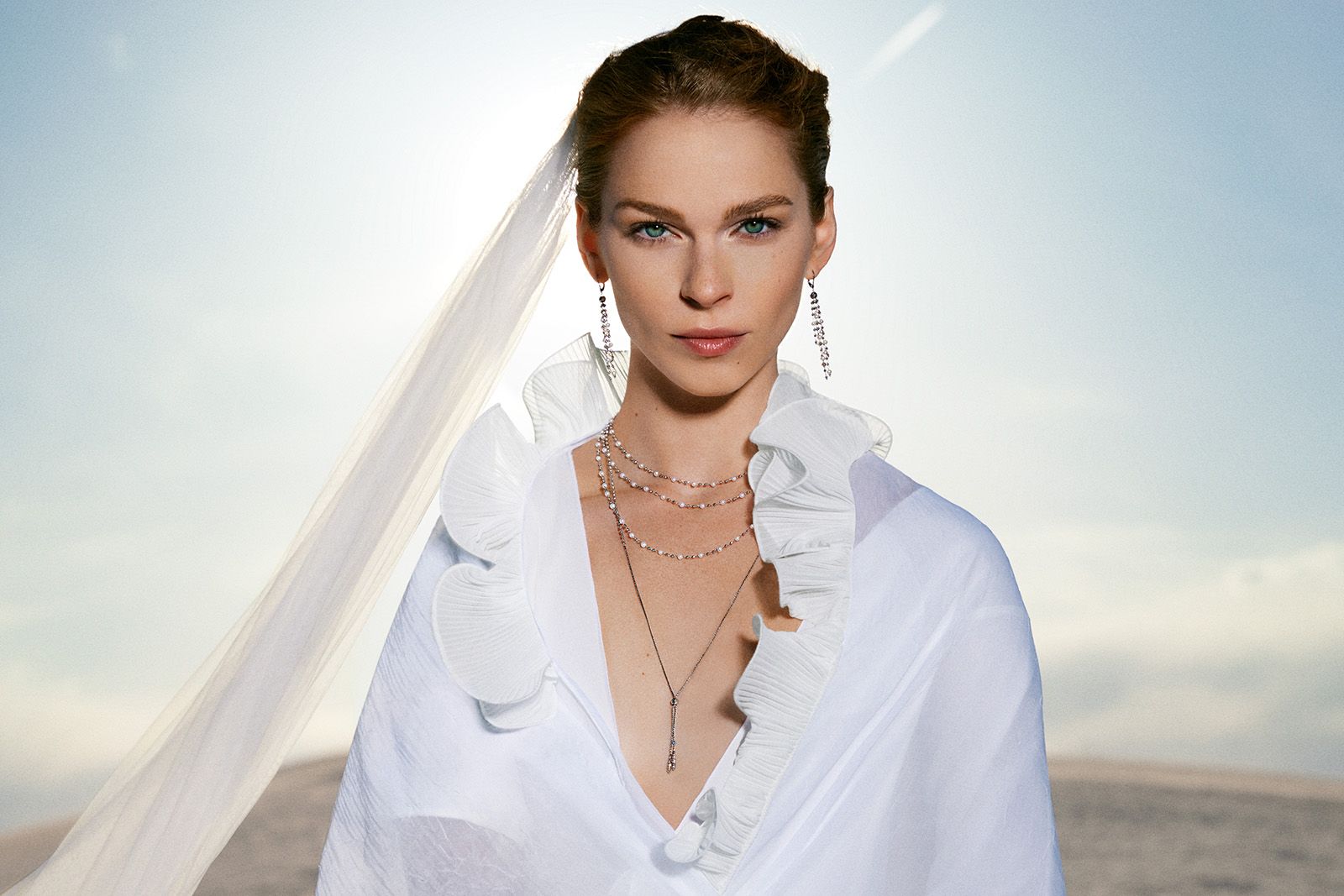  Model wearing Platinum Born platinum and diamond jewels