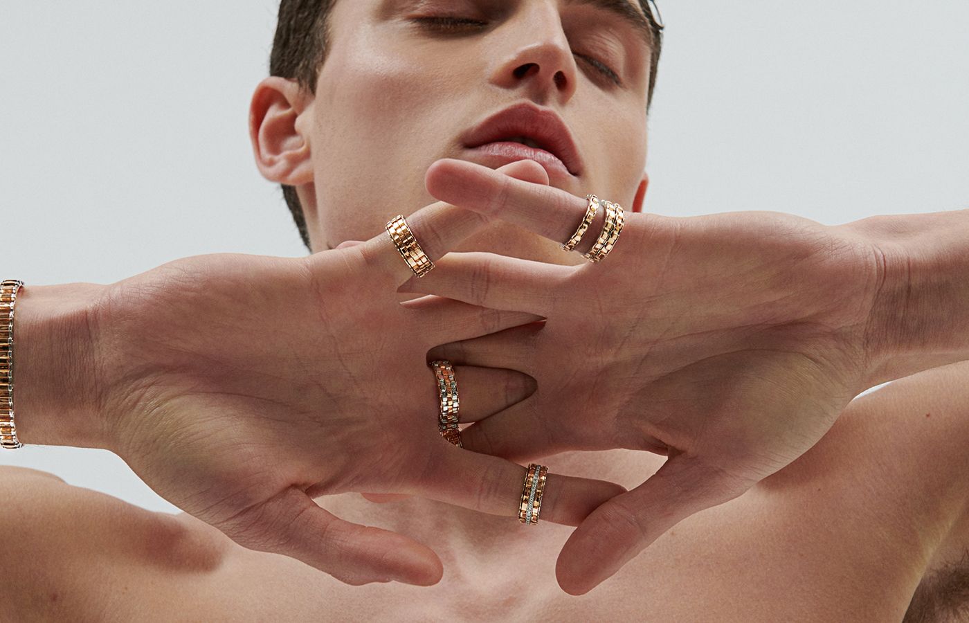 A male model wears rings and bracelets by Fullord