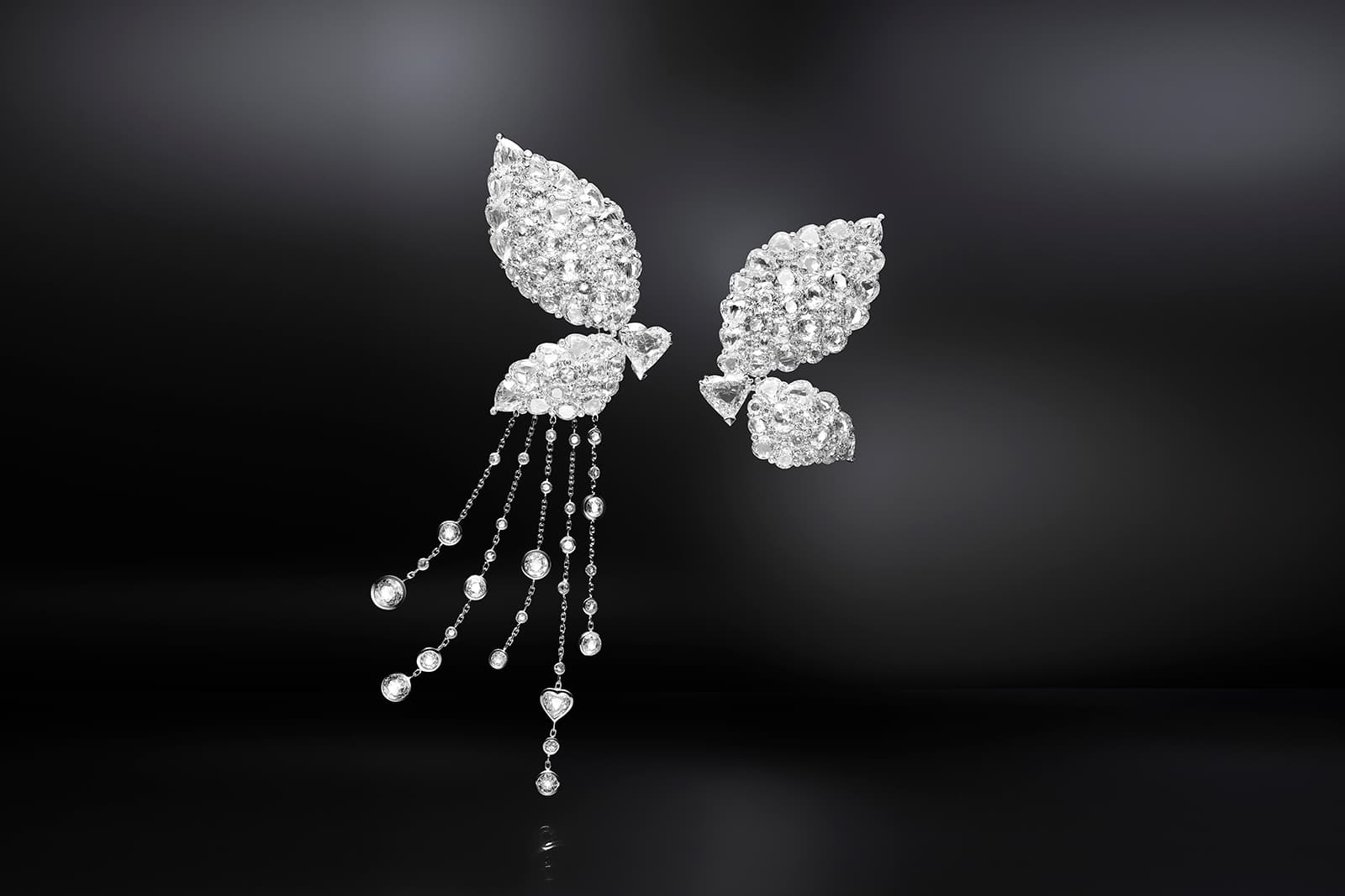  Chopard white gold and diamond Butterfly  High Jewellery asymmetric earrings from the Chopard X Mariah Carey Collection