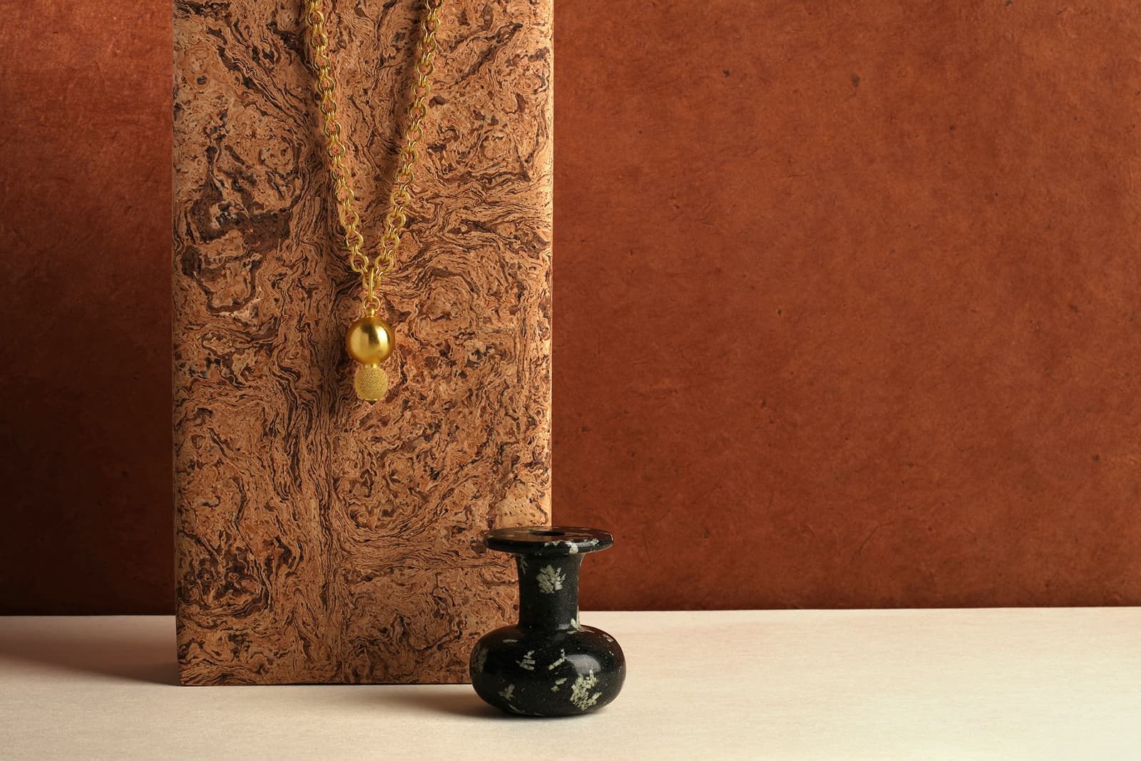 Loren Nicole Porphyry flask with 22k gold stopper/pendant necklace from the Vessels Made Wearable collection