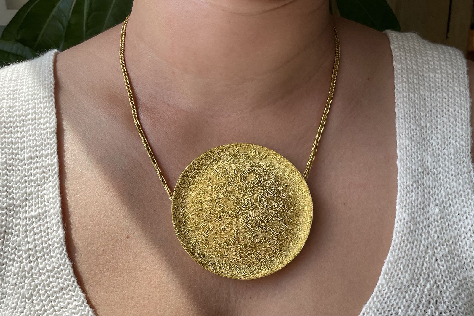  Loren Nicole gold pendant worn as a necklace from the Vessels Made Wearable collection 