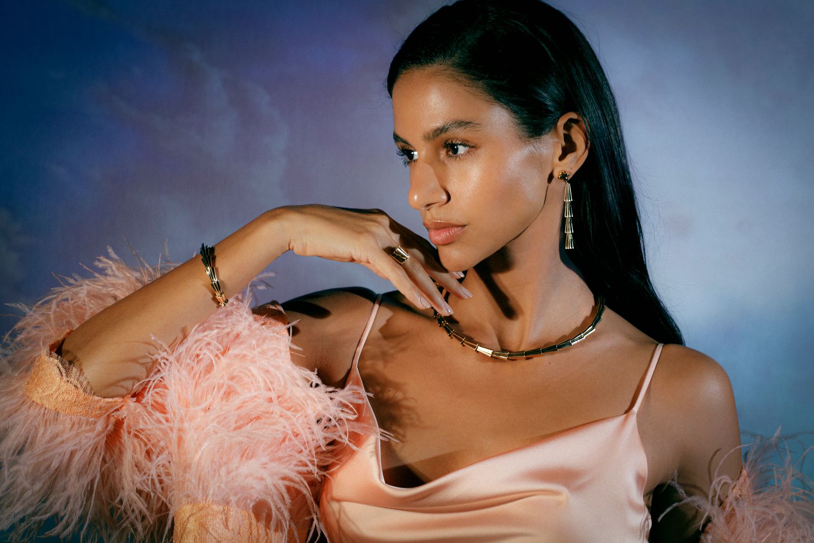 A model wears pieces from the TOKTAM Rumi collection