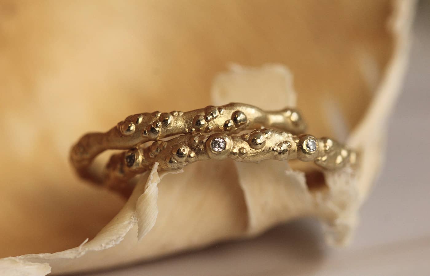  Judith Peterhoff 18k yellow gold and diamond Orno slim diamond wedding band with a 18k yellow gold Orno slim wedding band  