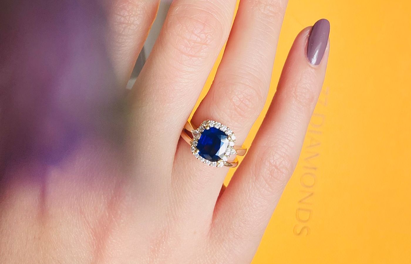  77 Diamonds sapphire and diamond ring with wedding band