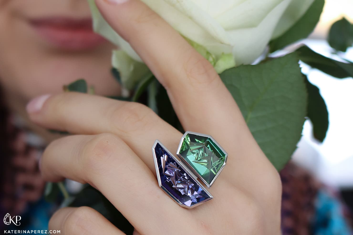 Katerina Perez wearing the Atelier Munsteiner Ensemble Playing ring with a fancy-cut tourmaline and tanzanite in platinum