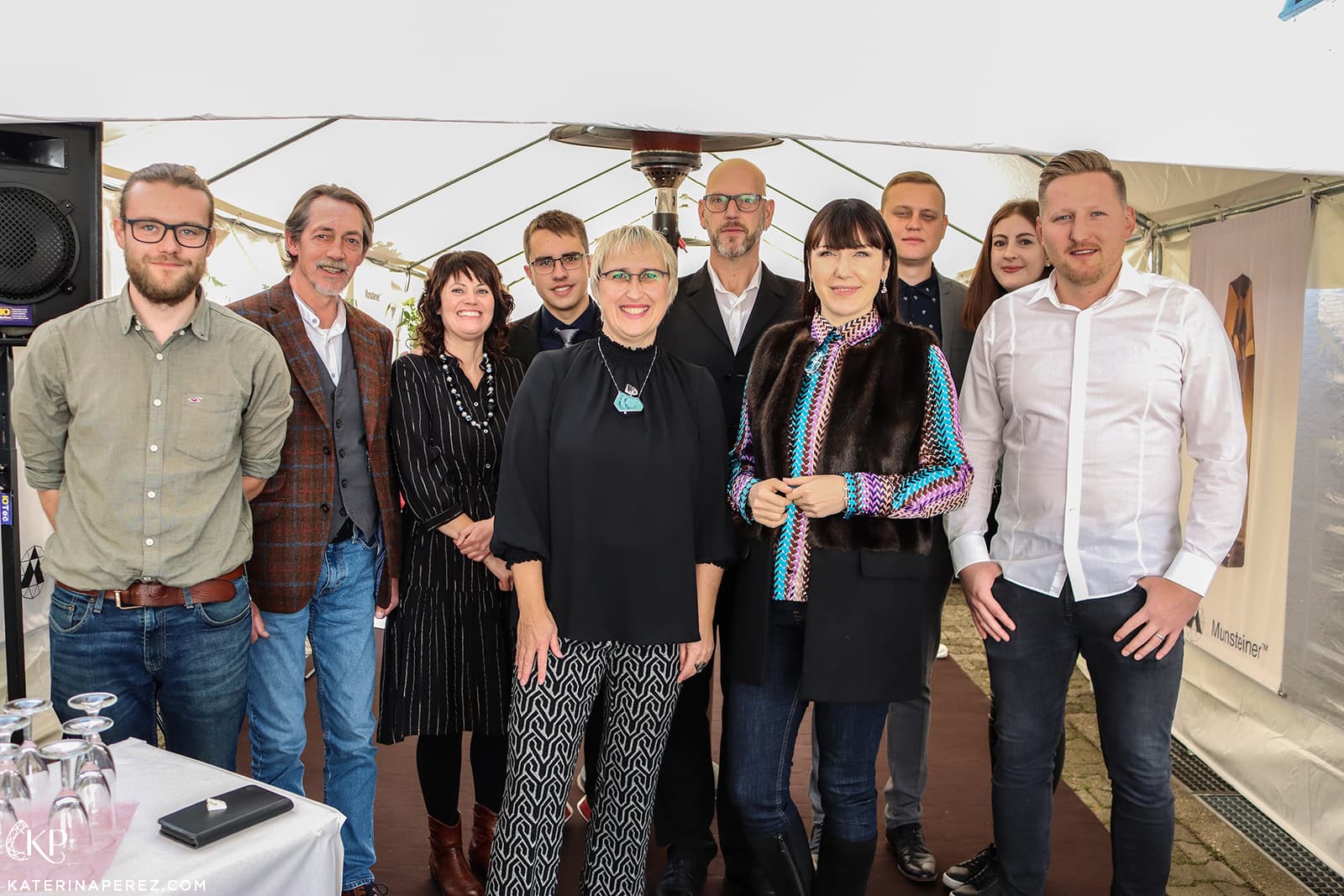 Katerina Perez and the Atelier Munsteiner team at an event to celebrate the opening of its 13th studio exhibition in Stipshausen, Germany