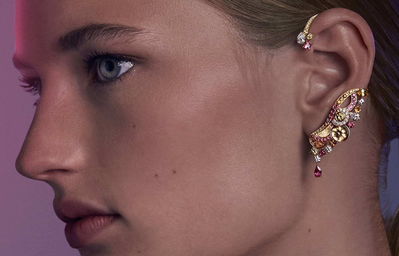 Model wearing Piaget Fresh Surprise Earcuff in rose gold, sapphire, spinel, spessartite, citrine and diamond, from the Solstice by Piaget High Jewellery Collection, Chapter Two 
